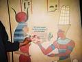 The Egyptian sun god Ra giving his woman friend a Jewish Sperm Donor card.